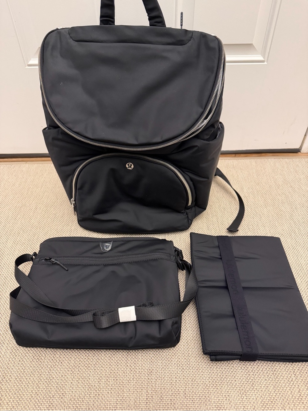 lululemon athletica Black Baby Backpack with Detachable Pouch and Changing Mat